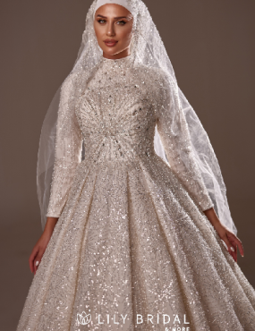 A woman is wearing a hijab and a wedding dress.
