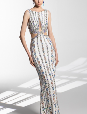 A woman is wearing a white dress with a cut out in the back