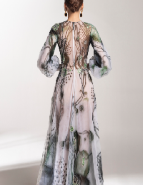 The back of a woman wearing a long dress with a floral print.