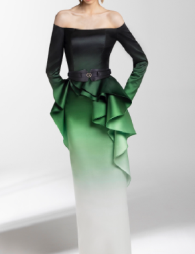 A woman is wearing a black and green dress