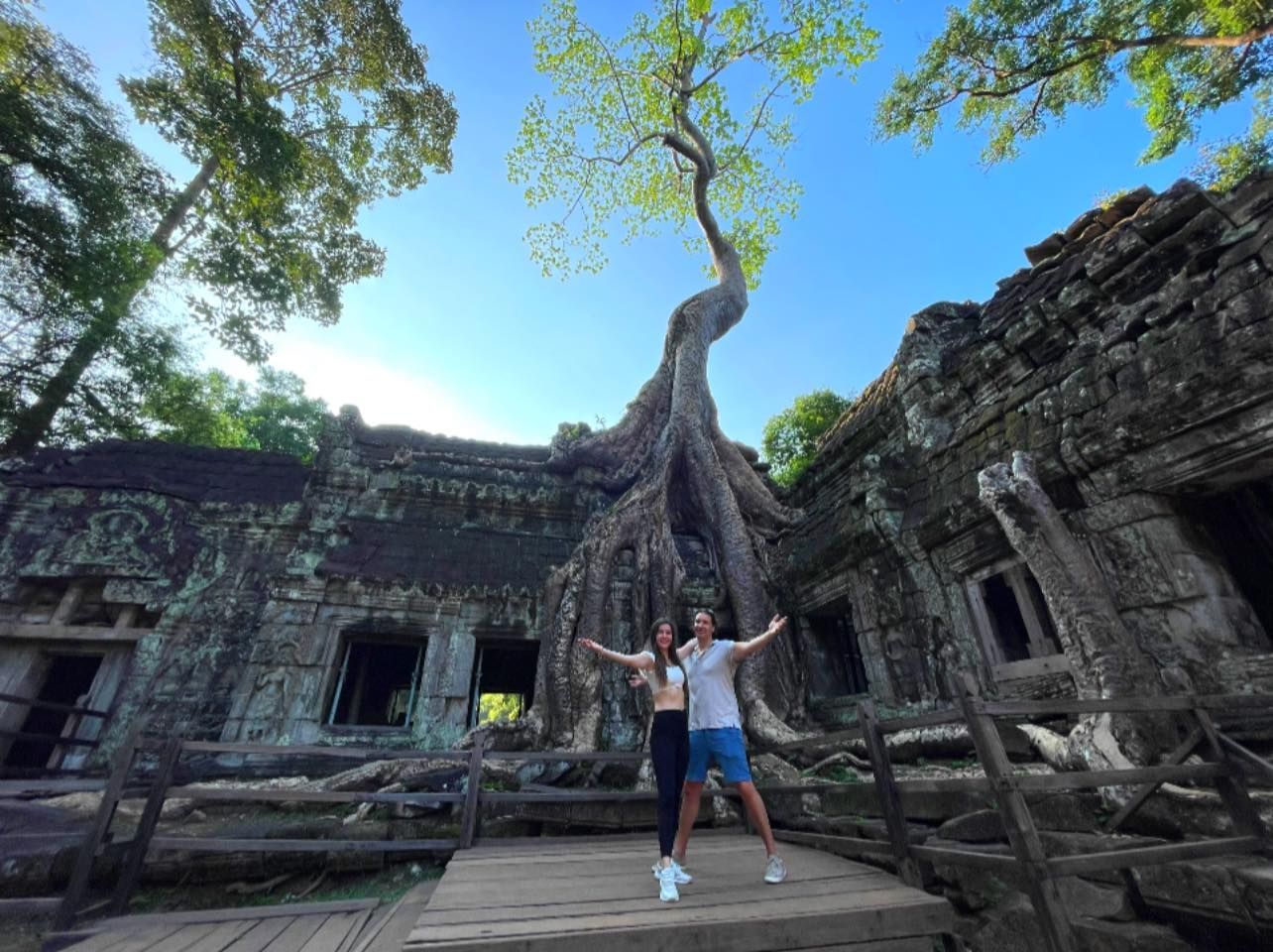 Travelers exploring Cambodia’s top highlights on a 16-day guided journey including Angkor Wat, Phnom Penh, and the Mekong River.