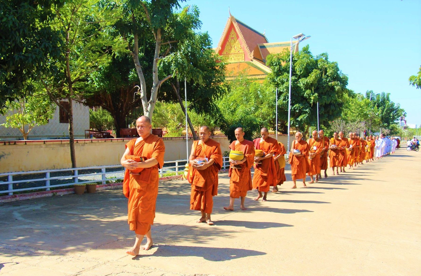 Tourists exploring Angkor Wat during a private Cambodia 14-day guided adventure.