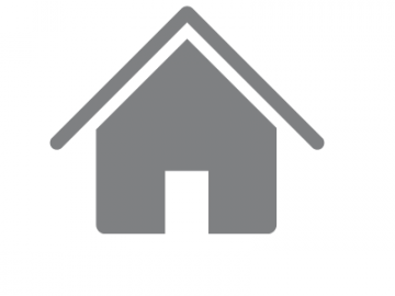 A simple, gray icon of a house with a triangular roof and a rectangular door.
