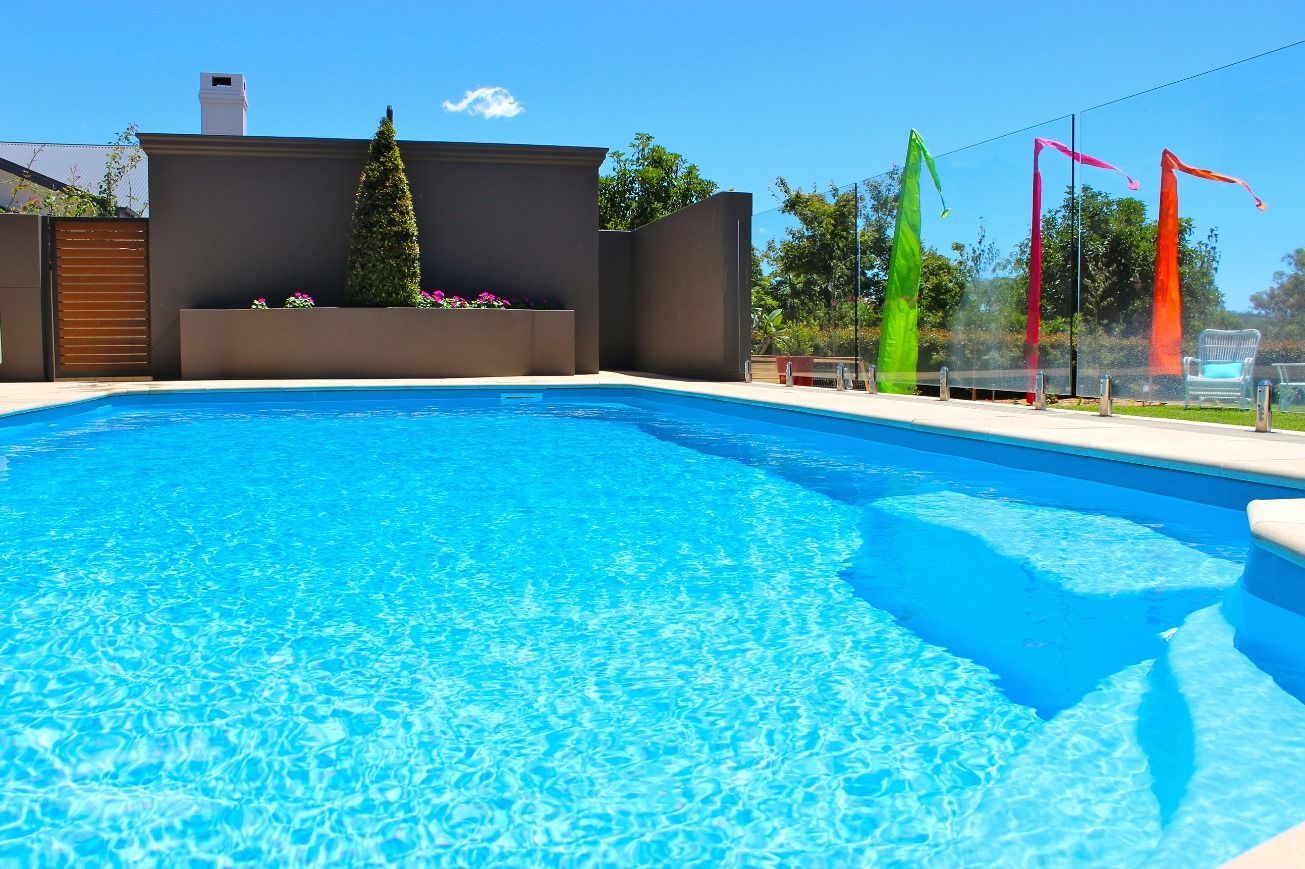 Backyard with Newly Installed Swimming Pool