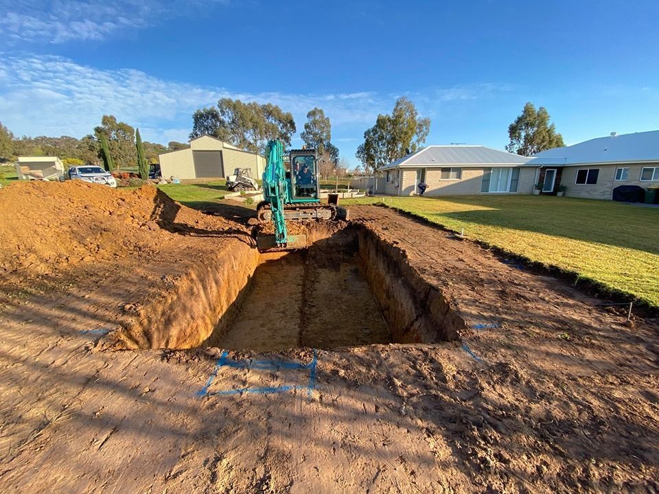Pool Excavate  And Construction And Industry Steel Ground Soil Dirt Structure — Spa & Pool Installation in Wagga Wagga, NSW