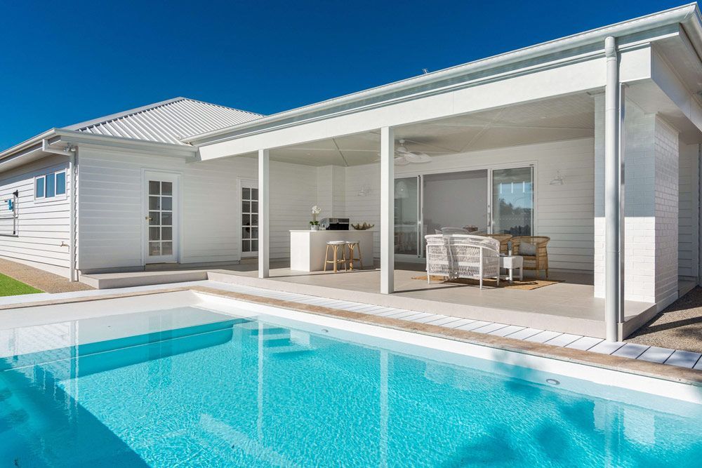 White Luxury House With Swimming Pool — Durable Fibreglass Pools in Wagga Wagga, NSW
