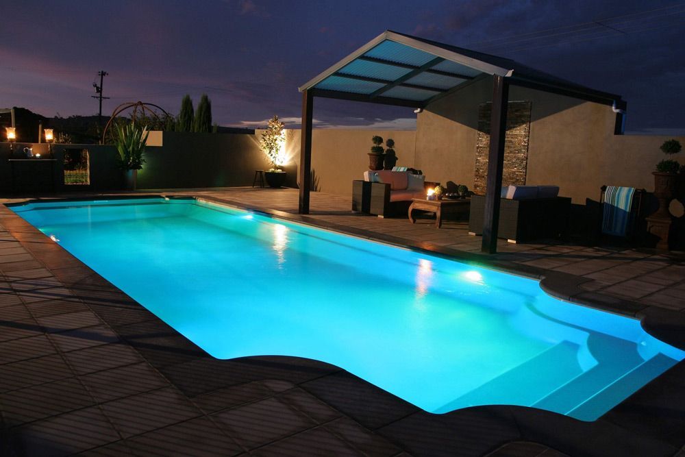 Aqua Swimming Pool And Night — Professional Pool Builder in Wagga Wagga, NSW