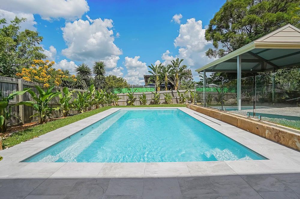 Backyard with Newly Installed Swimming Pool