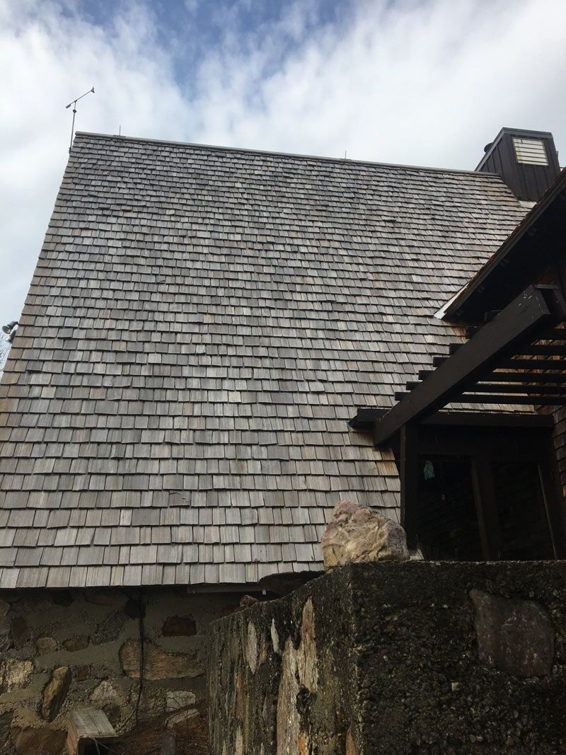 Wooden Shingles On A Log House — Fitzwilliam, NH — A. L. Johnson & Sons Roofing