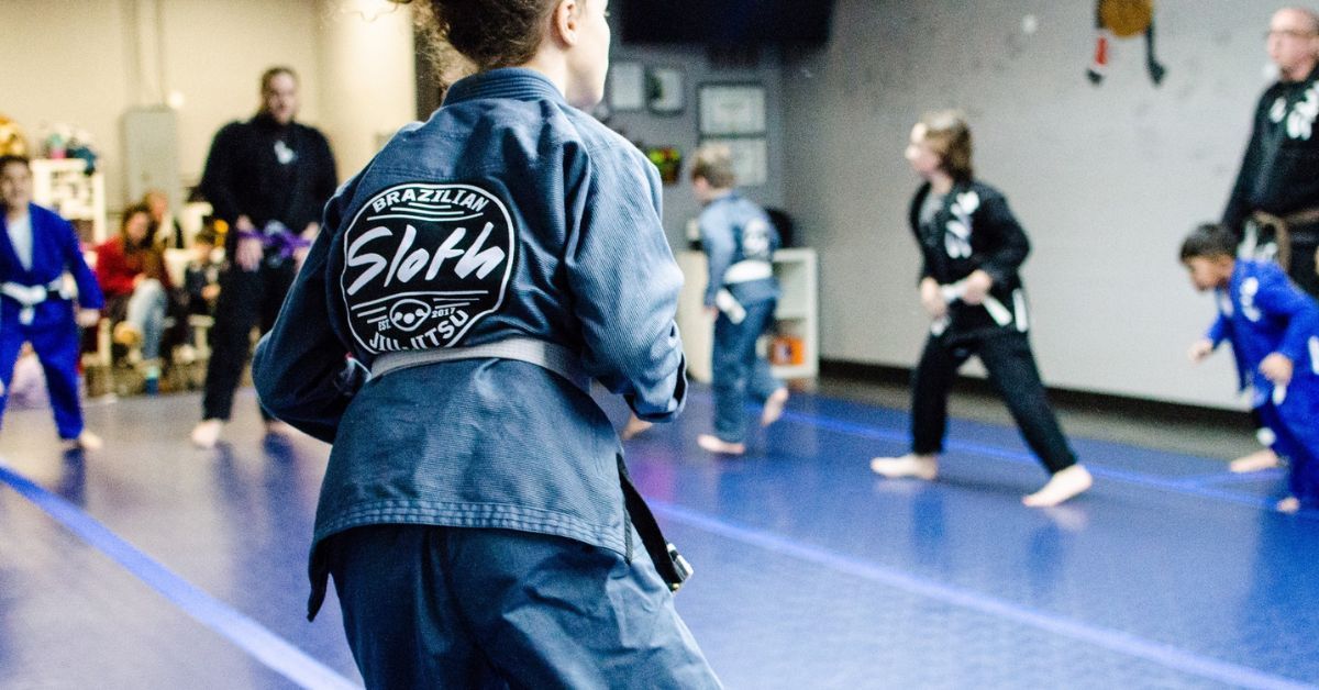 Kids warming up in jiu-jitsu class