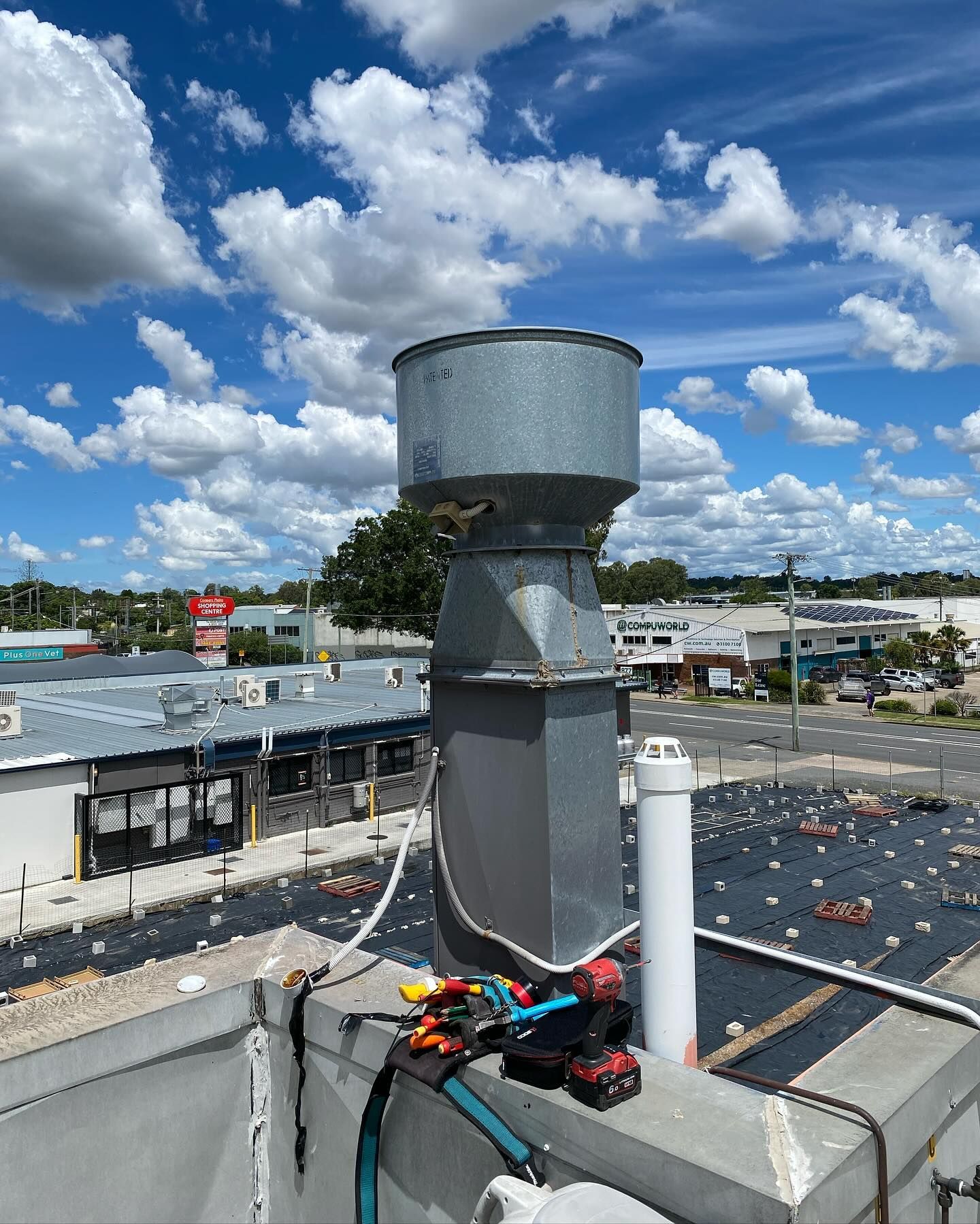 Commercial rooftop HVAC system installed by Brisbane electrician