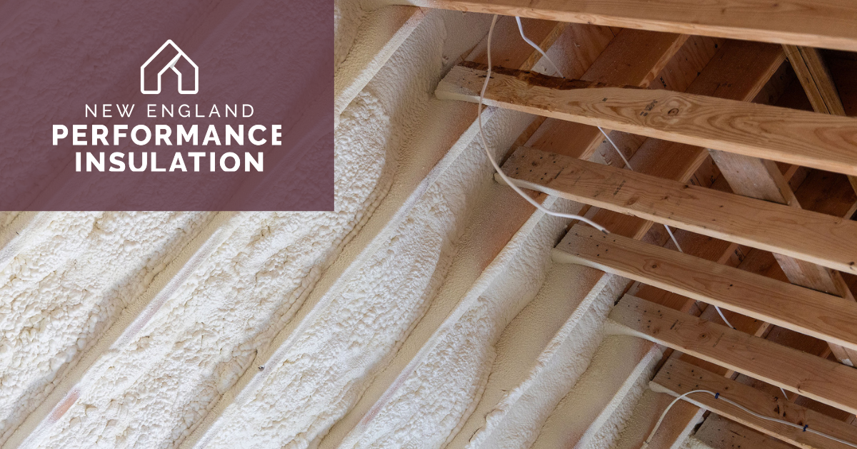 Foam insulation applied between wooden roof rafters, with a New England Performance Insulation logo in the corner.