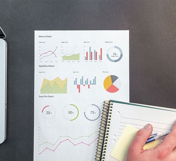 A Person Is Writing in A Notebook Next — Sunshine Coast Financial Advisers in Maroochydore, QLD