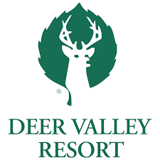 The deer valley resort logo shows a deer in a green leaf.