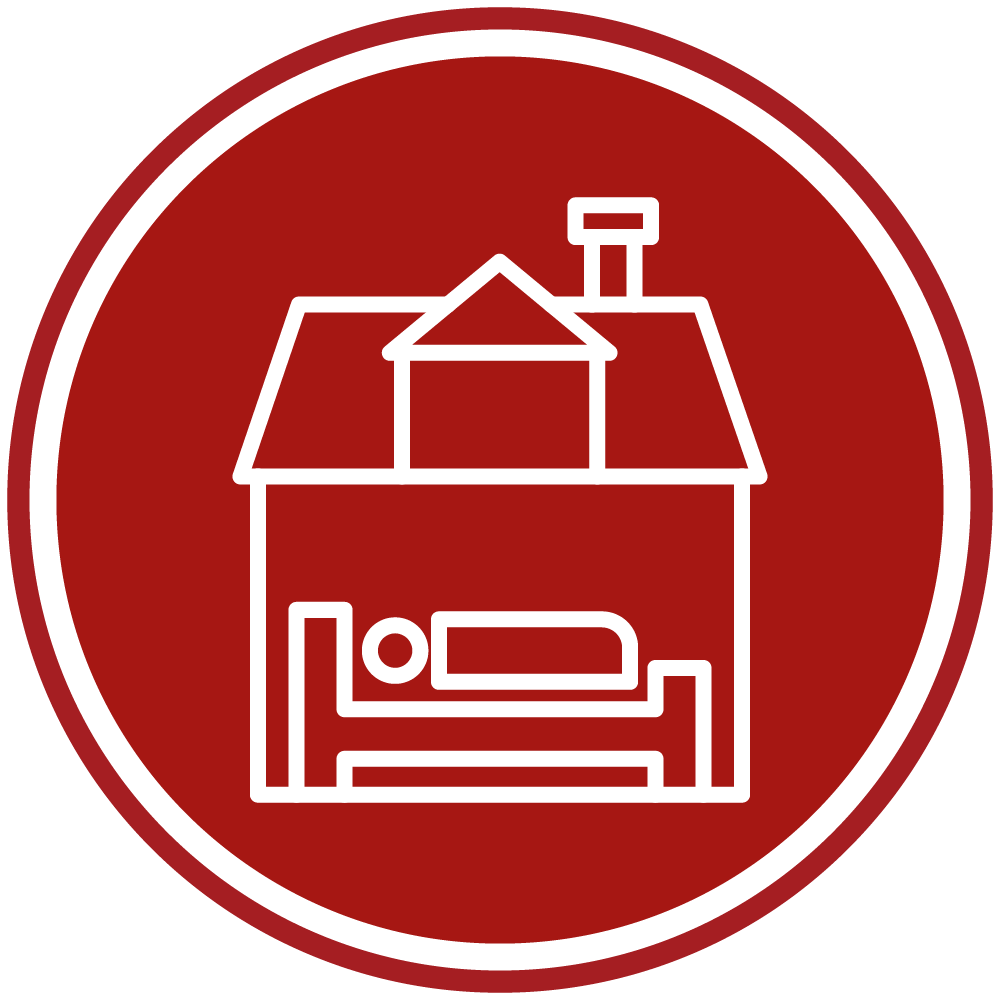 ไอคอนบ้านพร้อมเตียงนอนในวงกลมสีแดง แสดงหมวดหมู่บริการที่พักและที่อยู่อาศัยในนนทบุรี