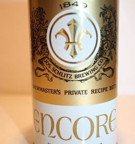 Close-up of a cream-and-gold Schlitz Brewing beer can labeled “Encore.”