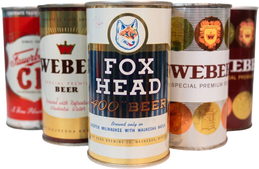 Assorted beer cans with a Fox Head beer can centered in front