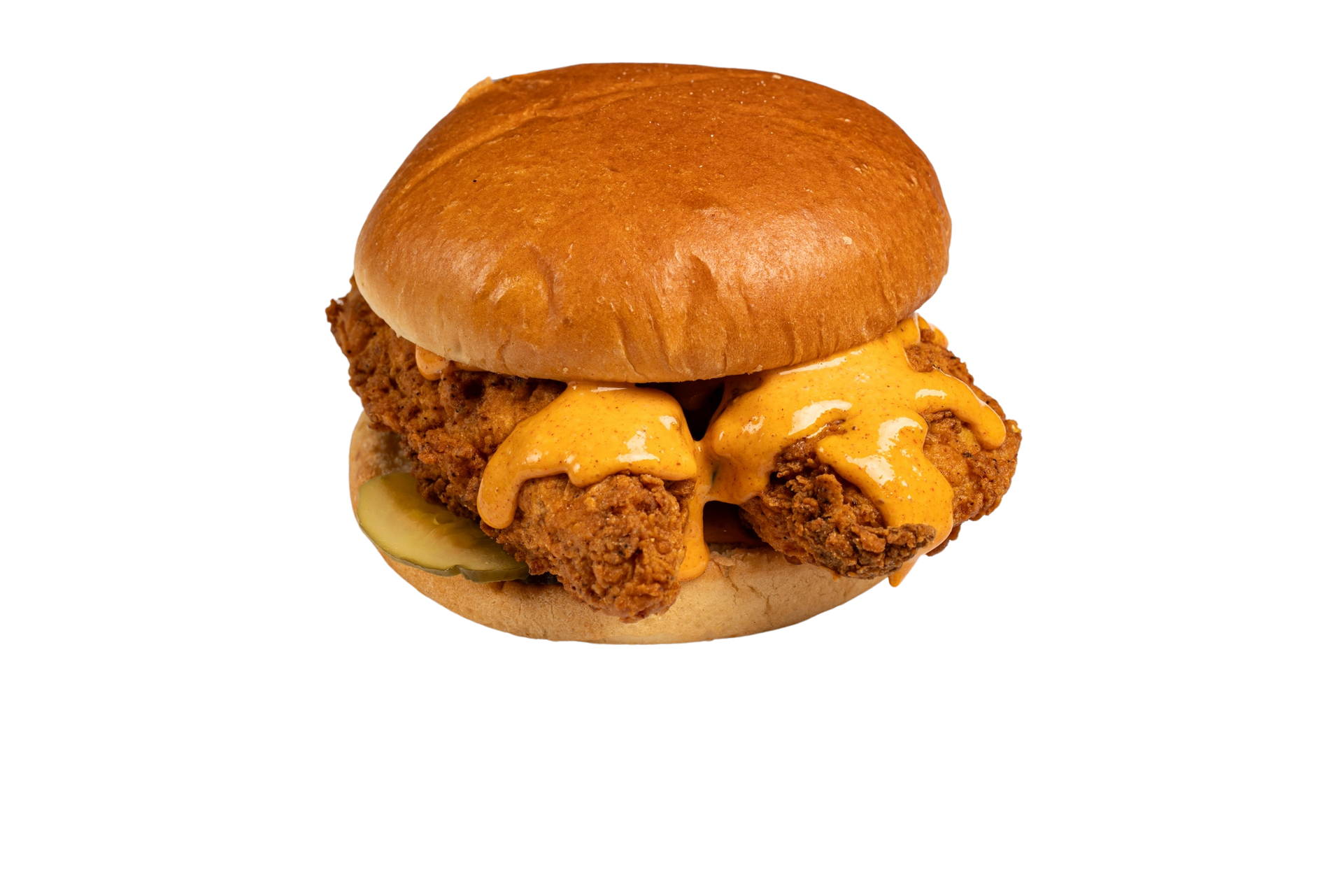 A fried chicken sandwich with cheese and pickles on a bun.