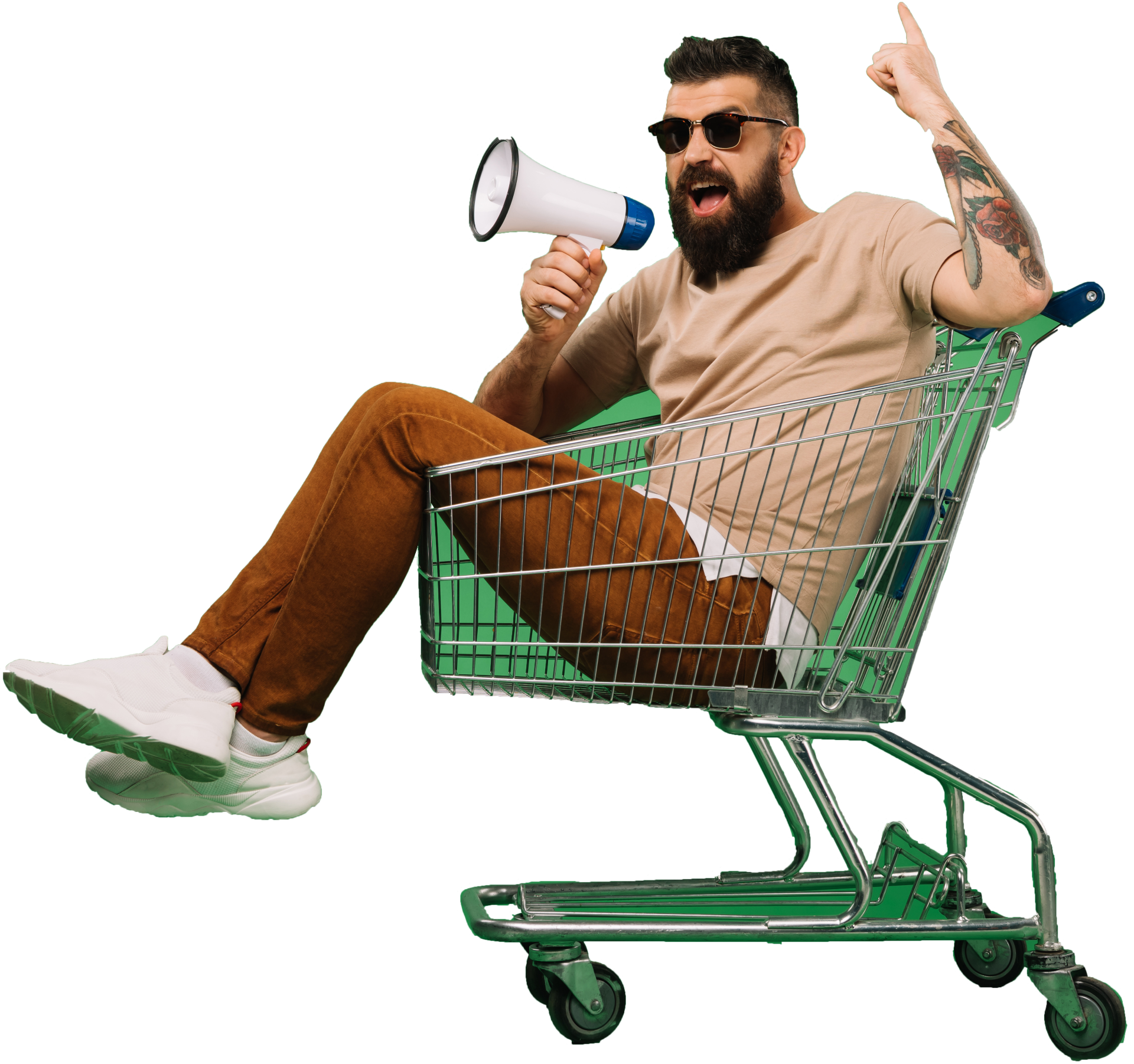 A man is sitting in a shopping cart holding a megaphone.