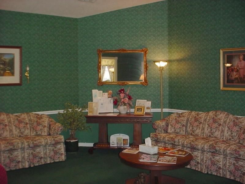 a living room with two couches and a table