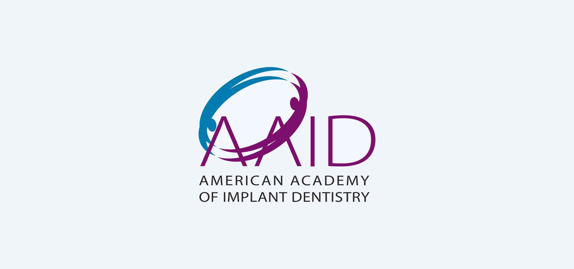 The logo for the american academy of implant dentistry.