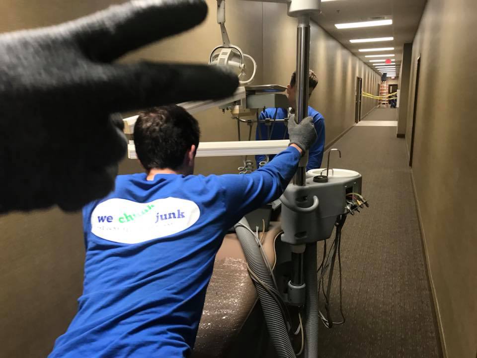 A man in a blue shirt with the word junk on it