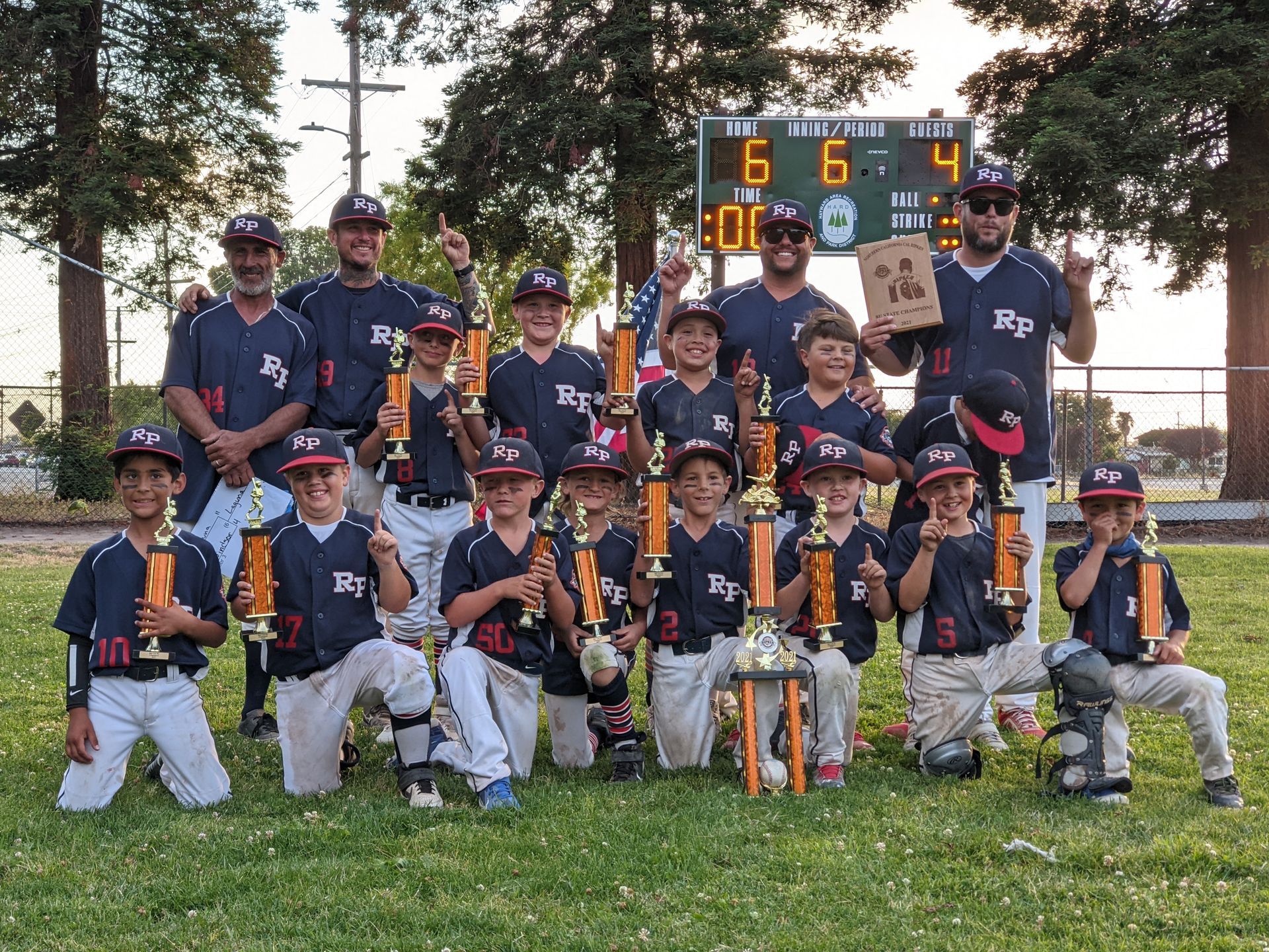 Rohnert Park Cal Ripken 8U All-Star team celebrating 2021 California State Championship victory