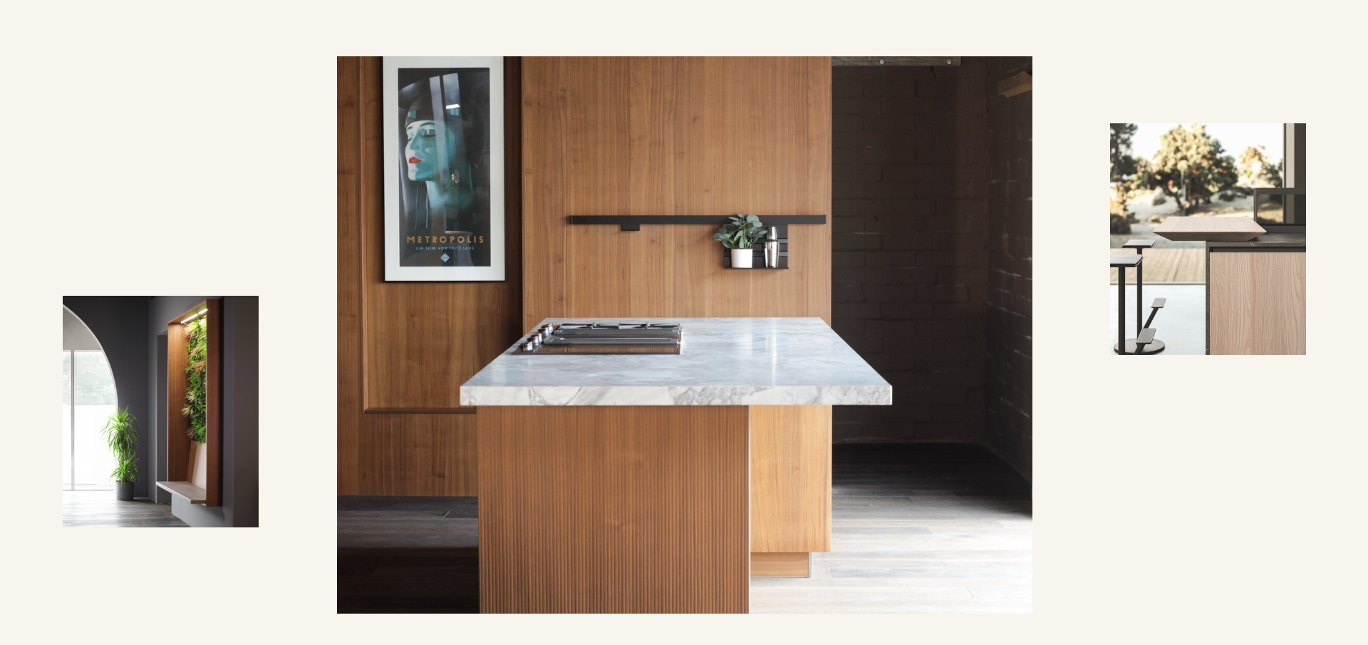 Kitchen with wooden cabinetry and island, marble countertop, and artwork. A side archway and view of flowers are also shown.
