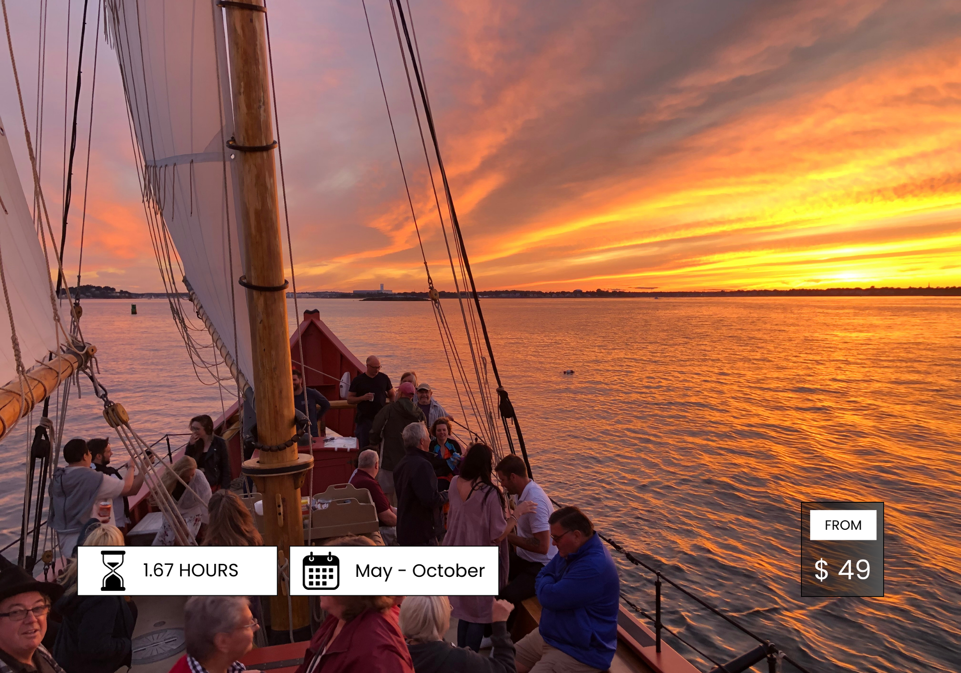 A group of people are sitting on a boat in the water at sunset.