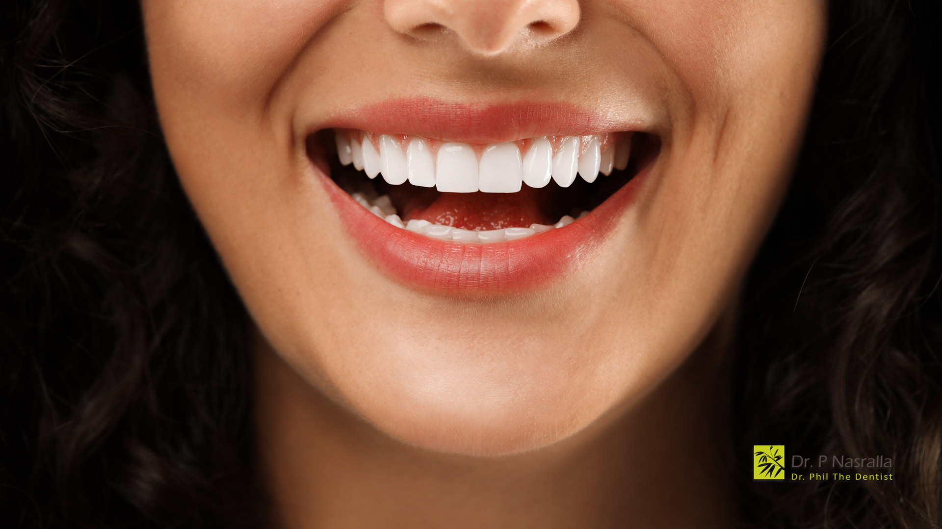 A close up of a woman 's mouth with a smile on her face