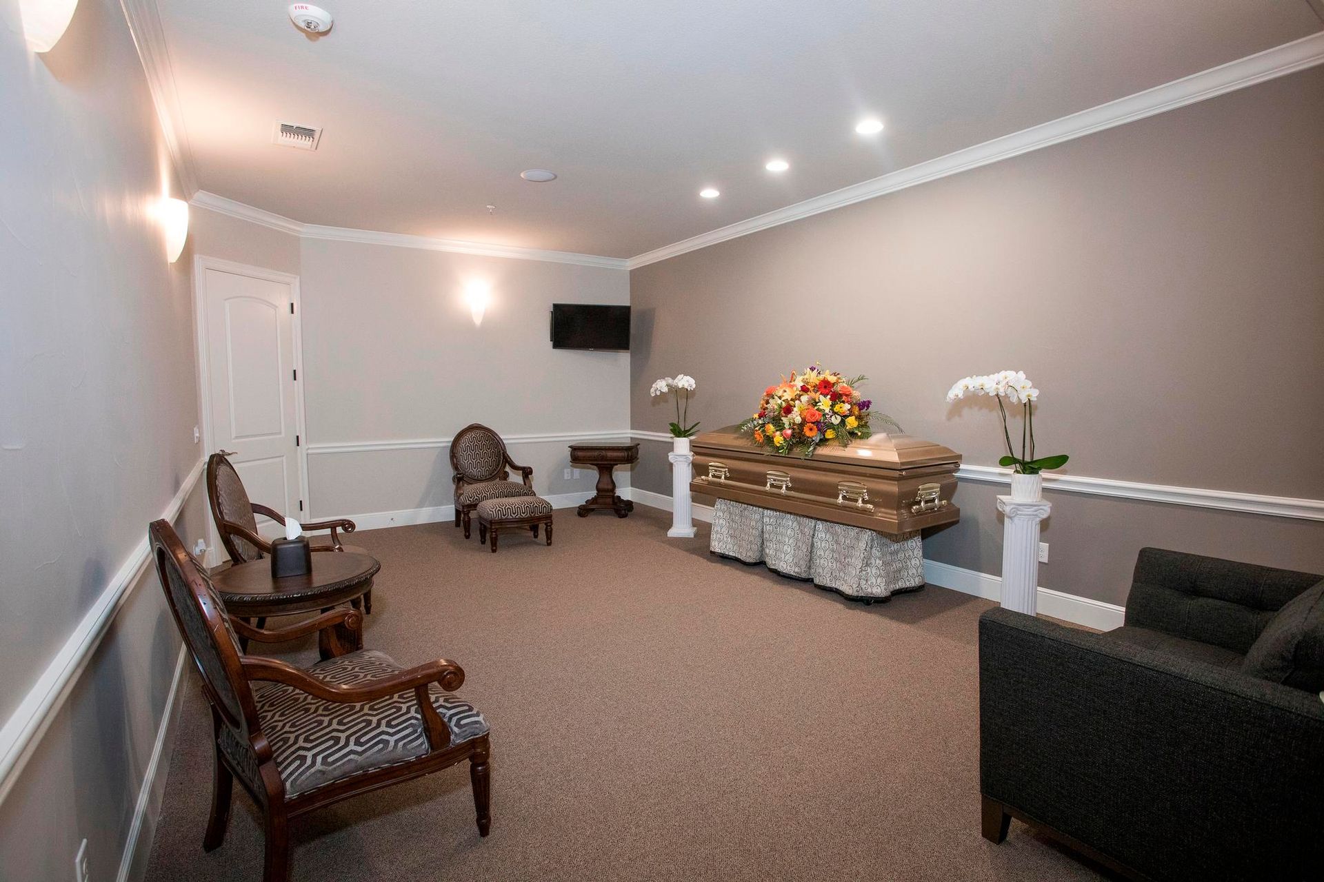 There is a coffin in the middle of the room.