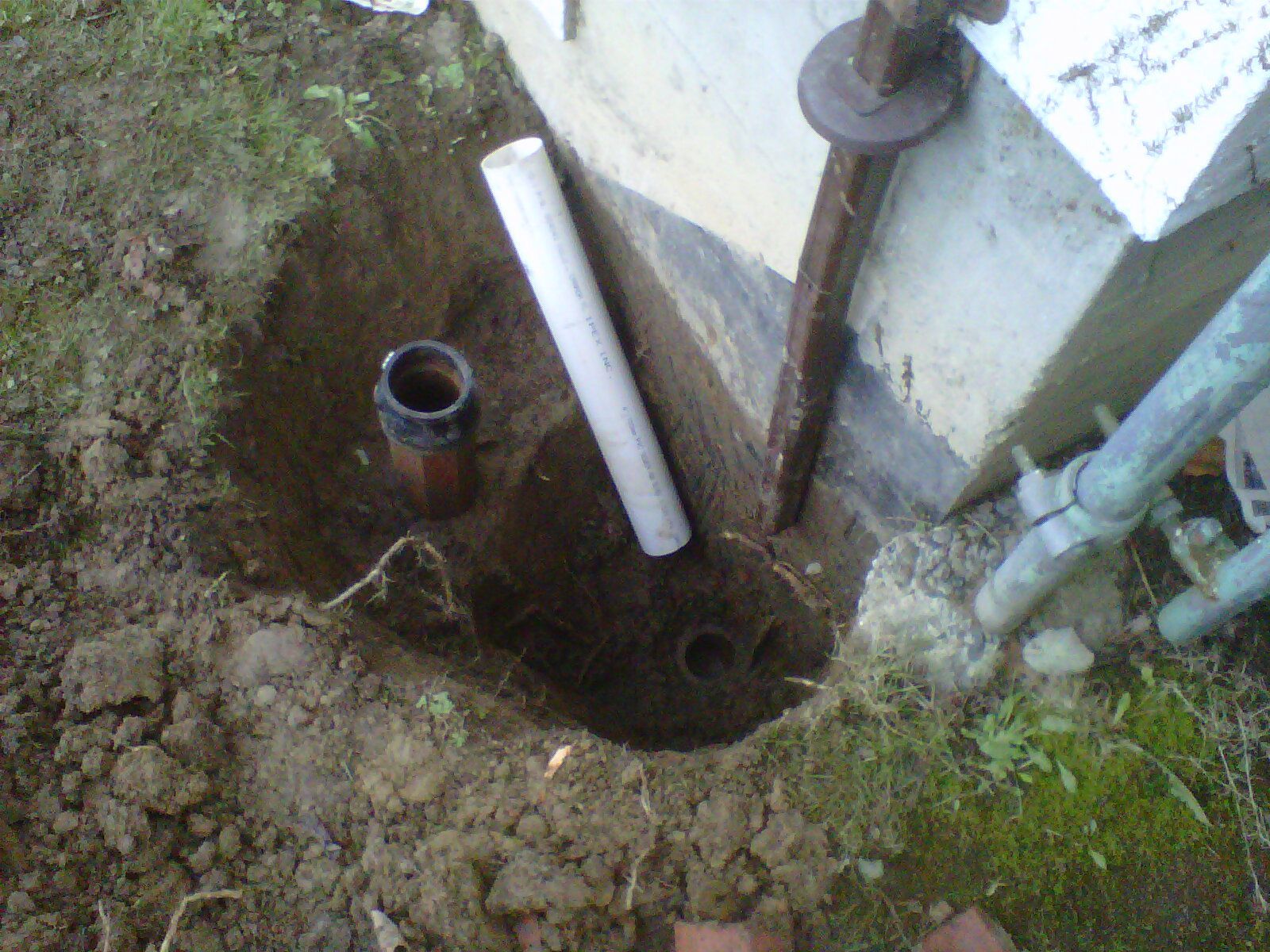 Replacing broken drain pipe with new 4 inch PVC pipe