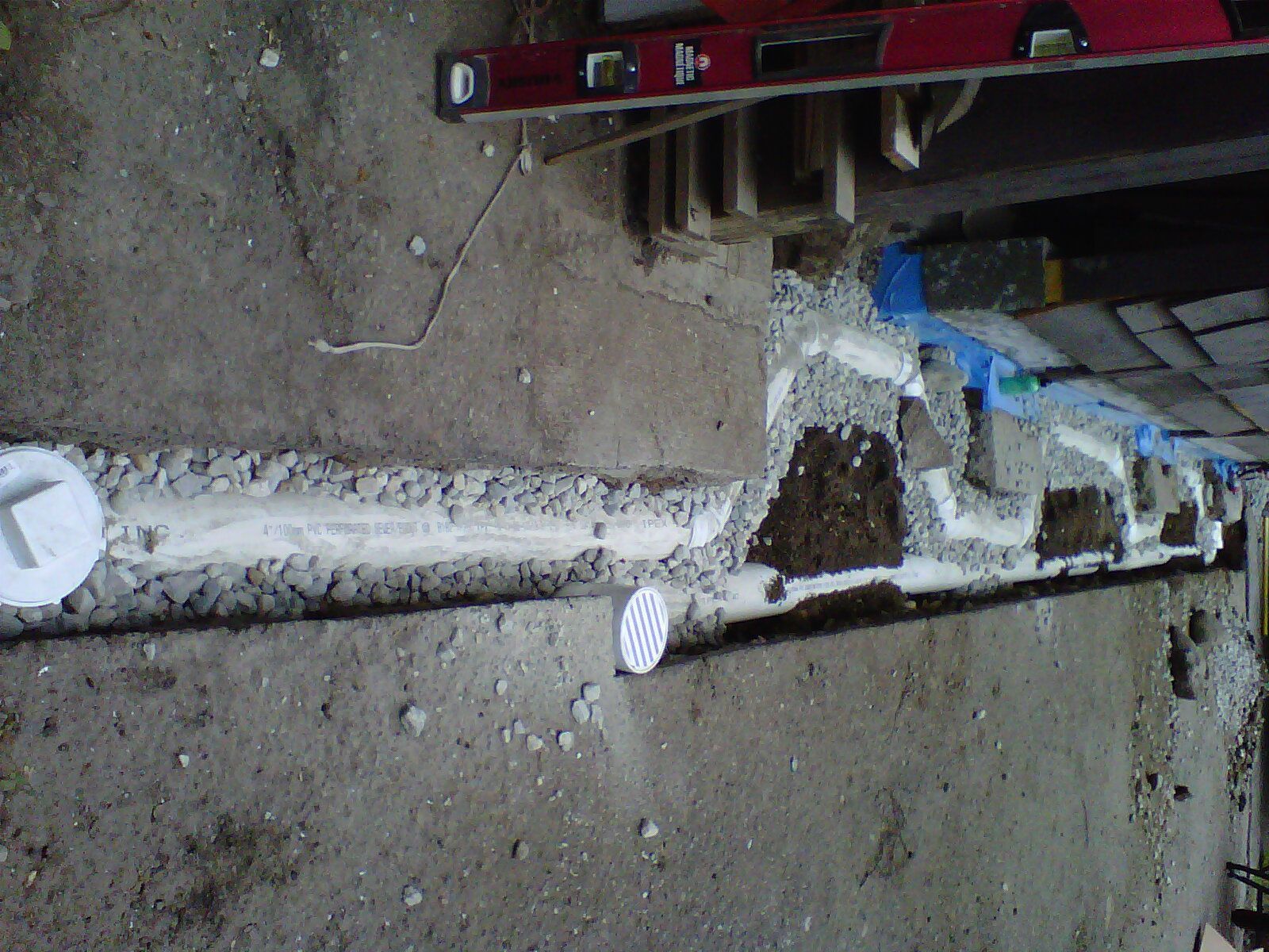 Replacing old weeping tile with new perimeter drain system