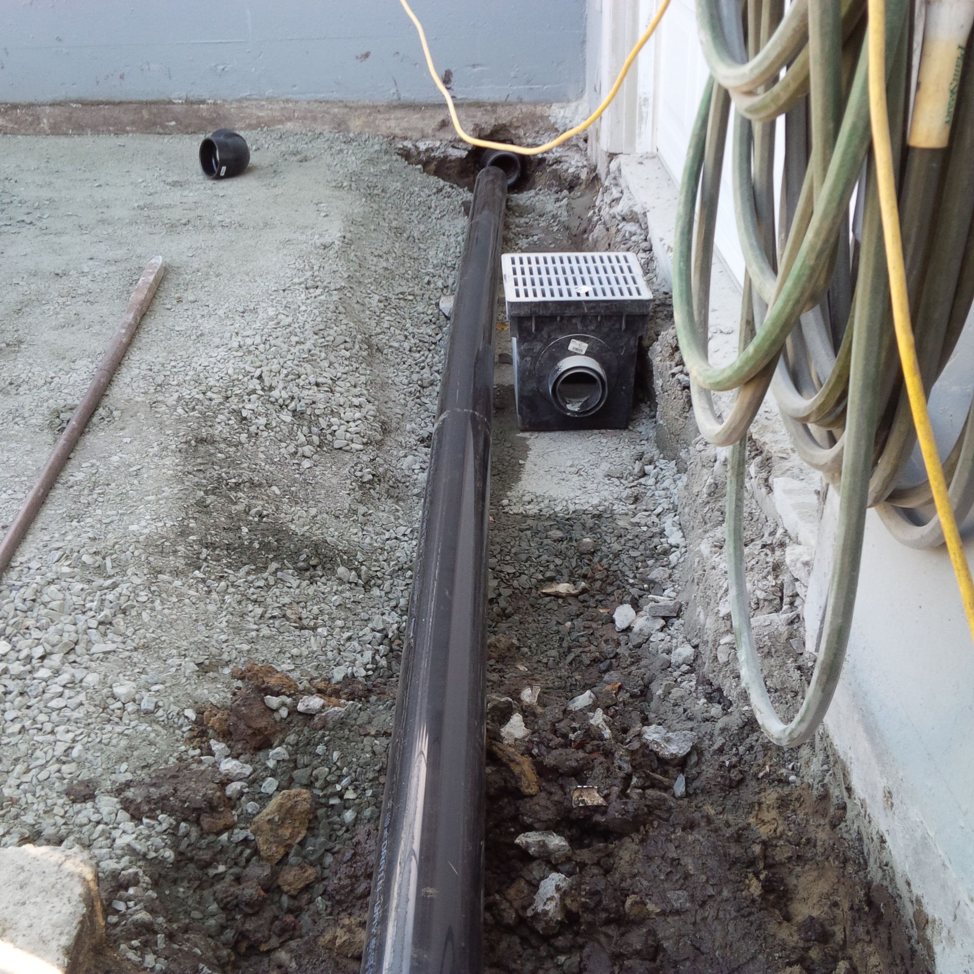 Replacing old weeping tile with new perimeter drains built to Victoria's latest building codes