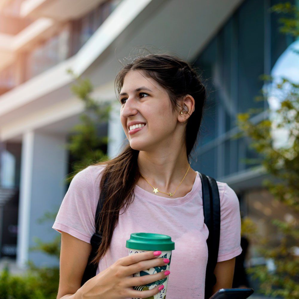 Woman Wearing a Hearing Aid — St. Paul, MN — Jackson Medical Equipment
