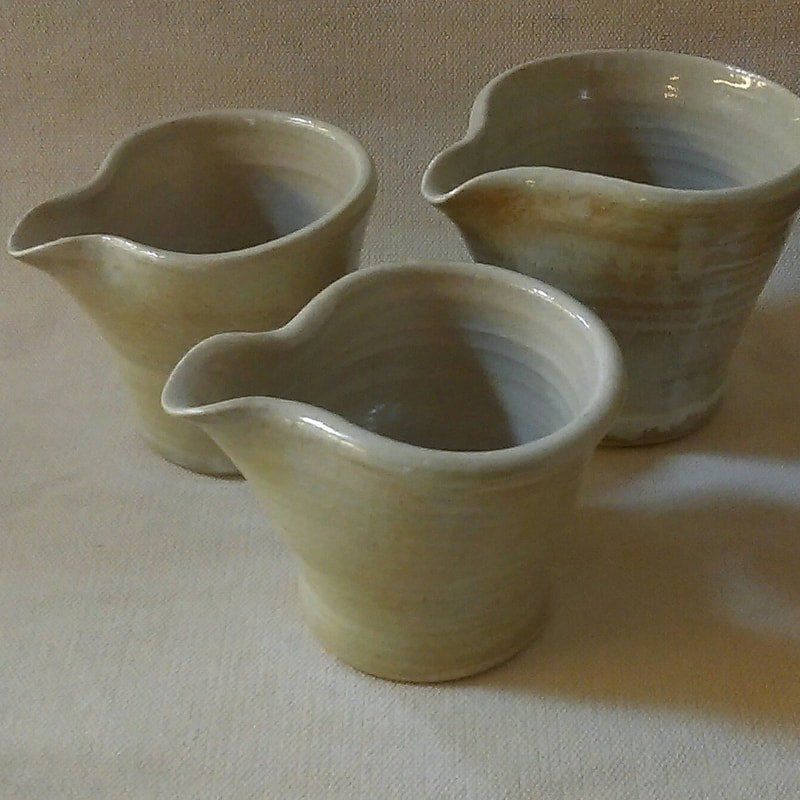 3 pouring vases