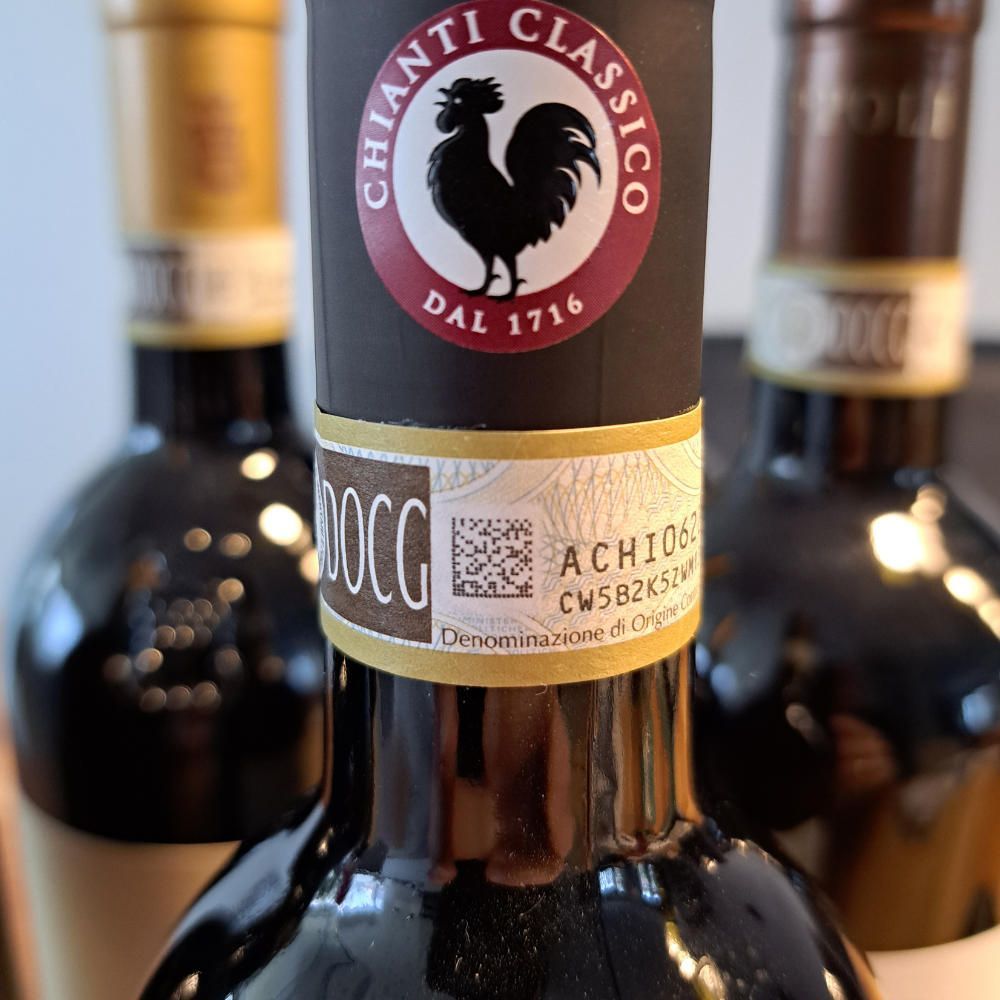 A bottle of Chianti DOCG wine with the label of the Black Rooster (The  Gallo Nero)