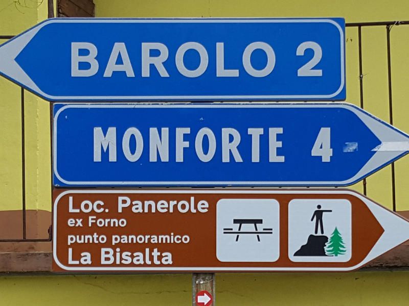 Road sign to visit the famous Barolo wine city in Italy.