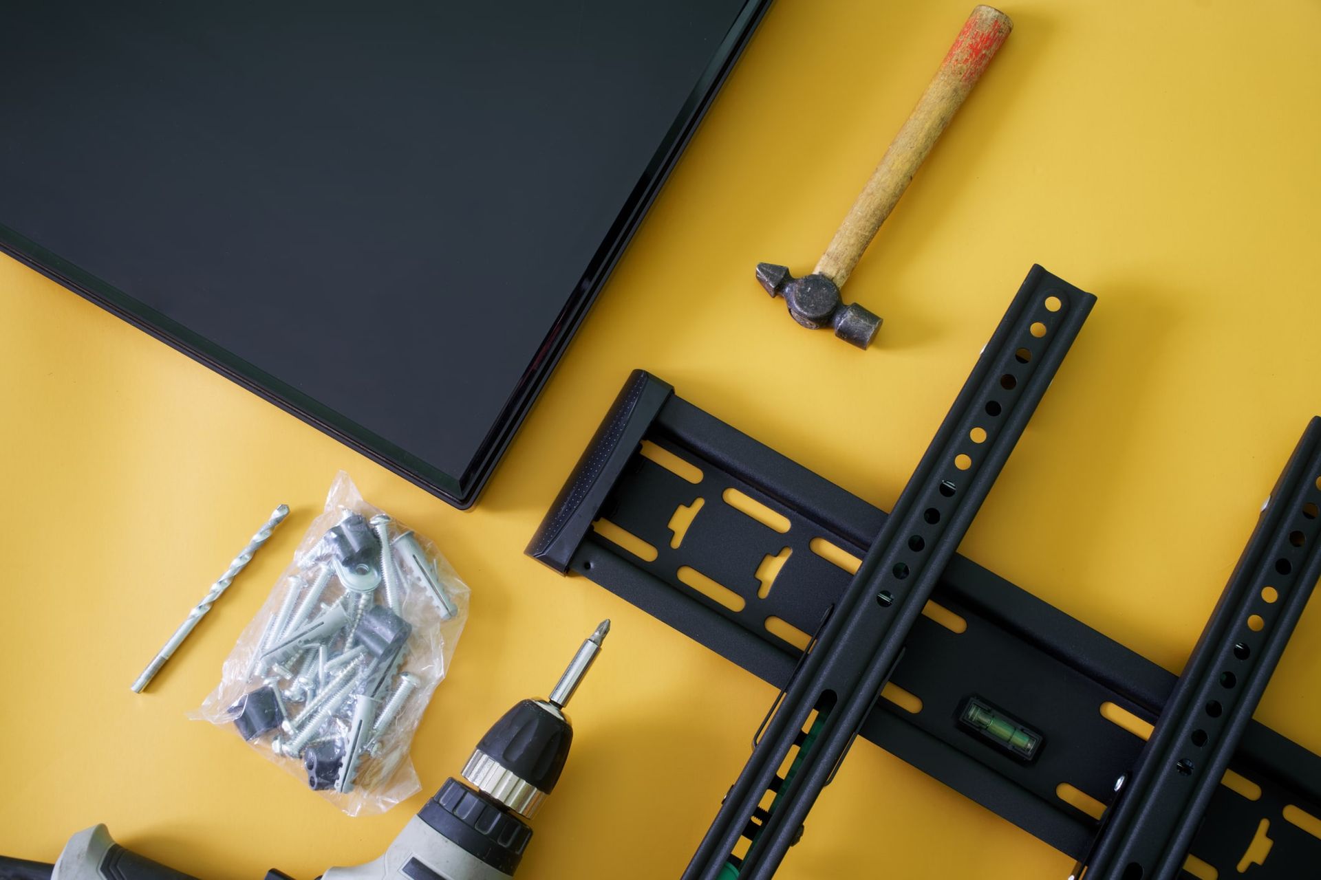image of parts used to hang a TV