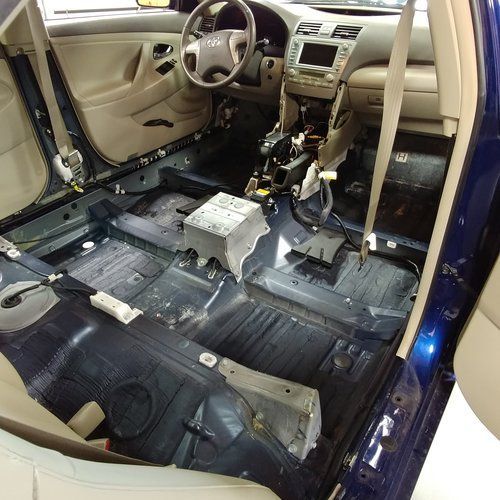 the interior of a car is being dismantled .