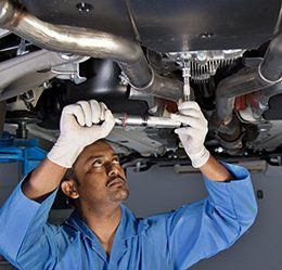 fixing a car - Auto Repairs, Rental Cars in Bartonsville, PA