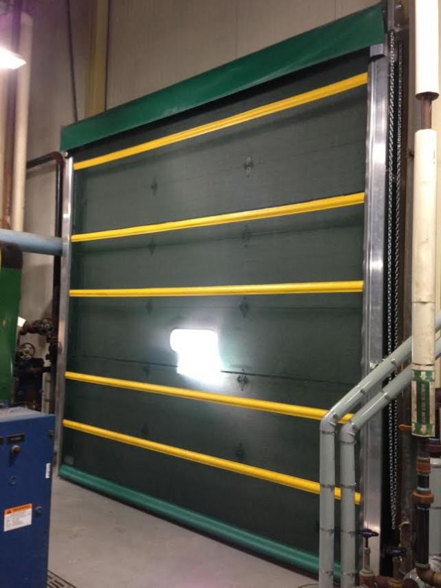 A green door with yellow stripes on it