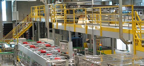 A factory with a lot of machinery and stairs