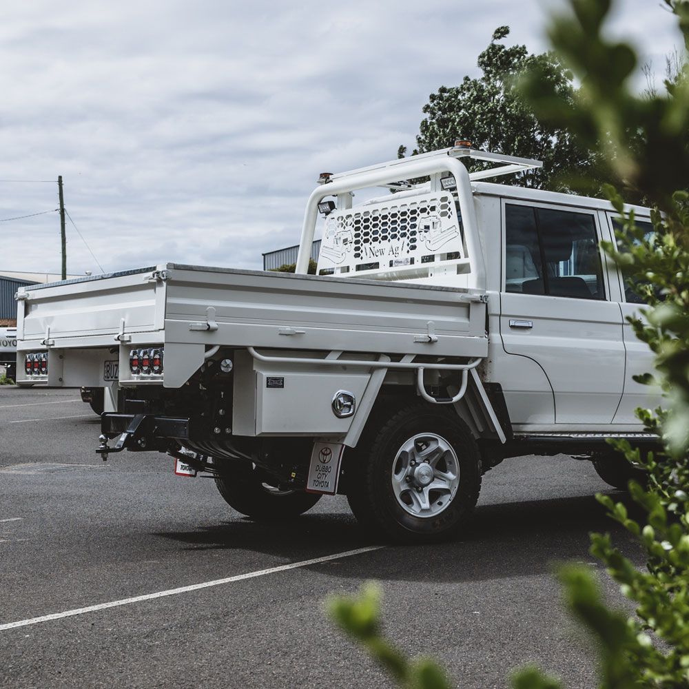 White Toyota Hi-Lux Customised With Steel Tray — Welding Works in Dubbo, NSW
