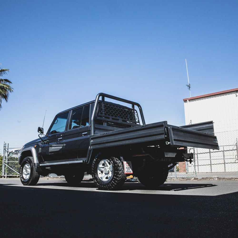 Black Truck With Steel Ute Tray Under The Sun — Welding Works in Parkes, NSW