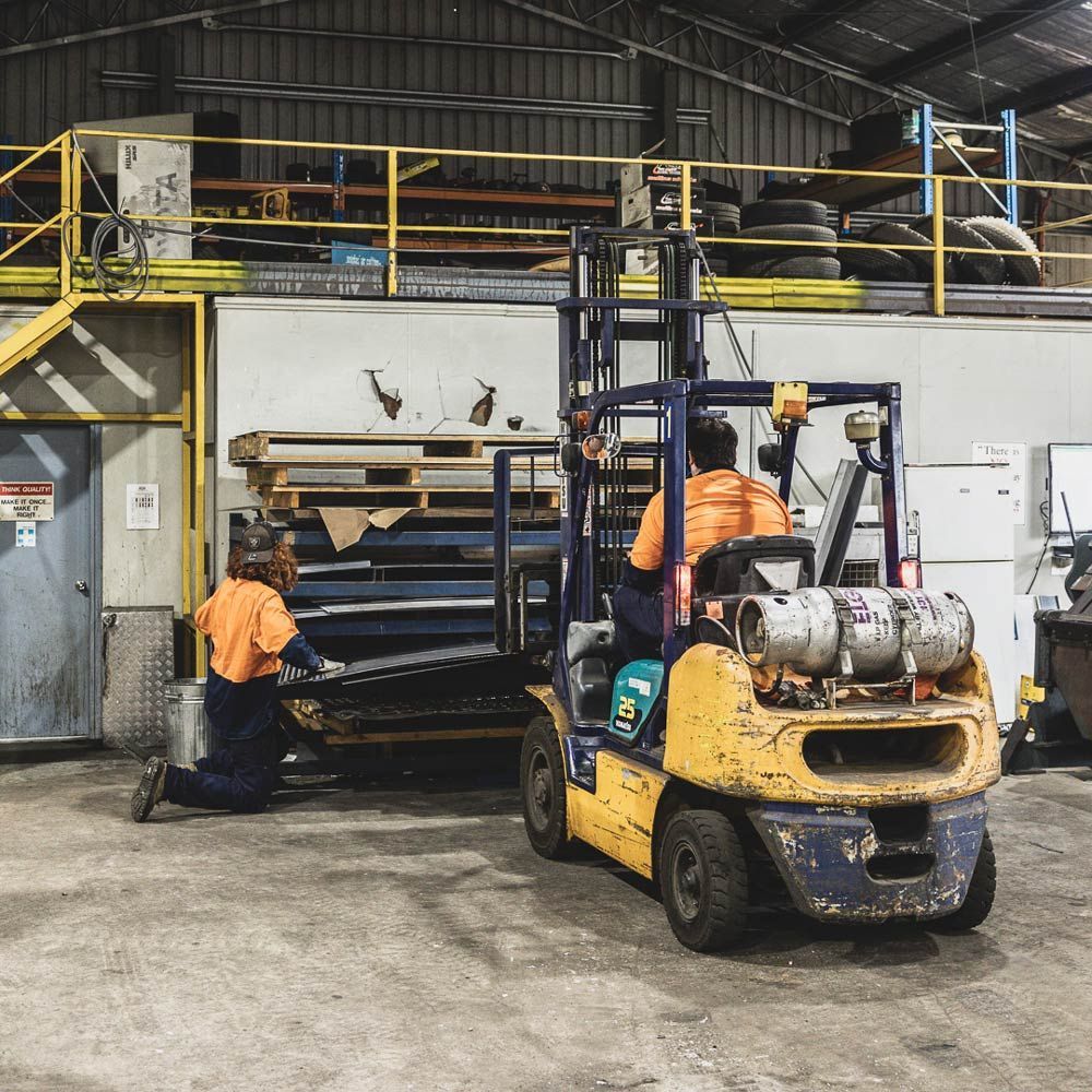 Forklift Inside Warehouse — Welding Works in Cobar, NSW