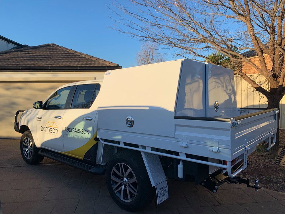 White Hi-Lux With Mounted Custom Toolbox In The Tray — Welding Works in Bathurst, NSW