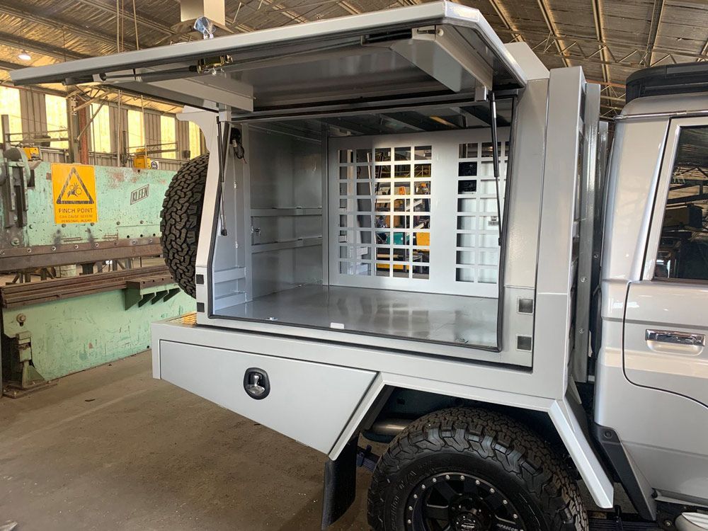 Open Lid Of Steel Tool Box — Welding Works in Orange, NSW