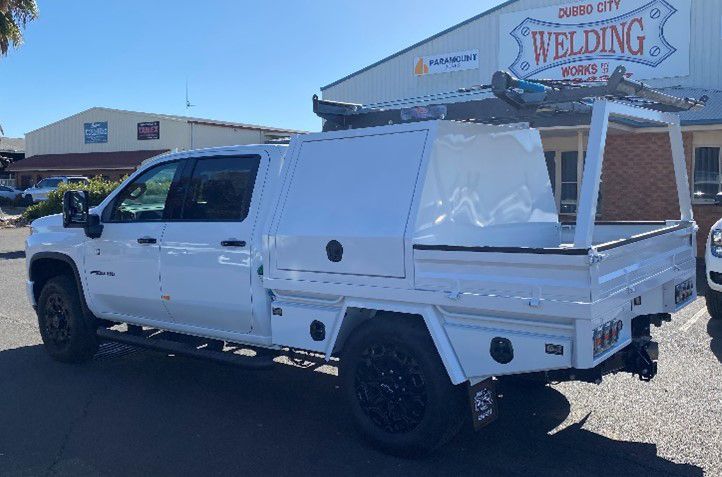 White Custom Ute Near Shop