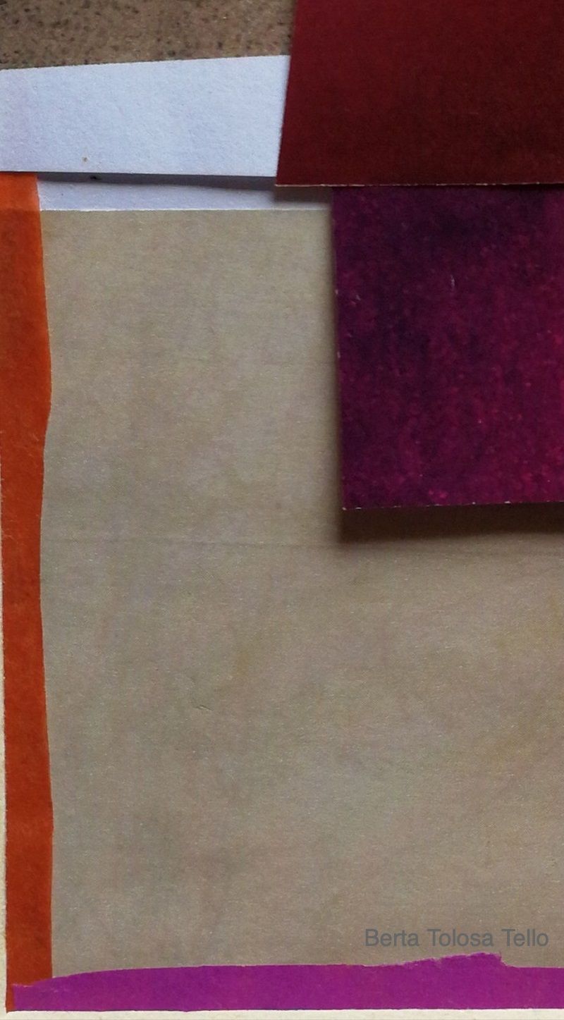 Un trozo de papel con un borde morado y naranja.